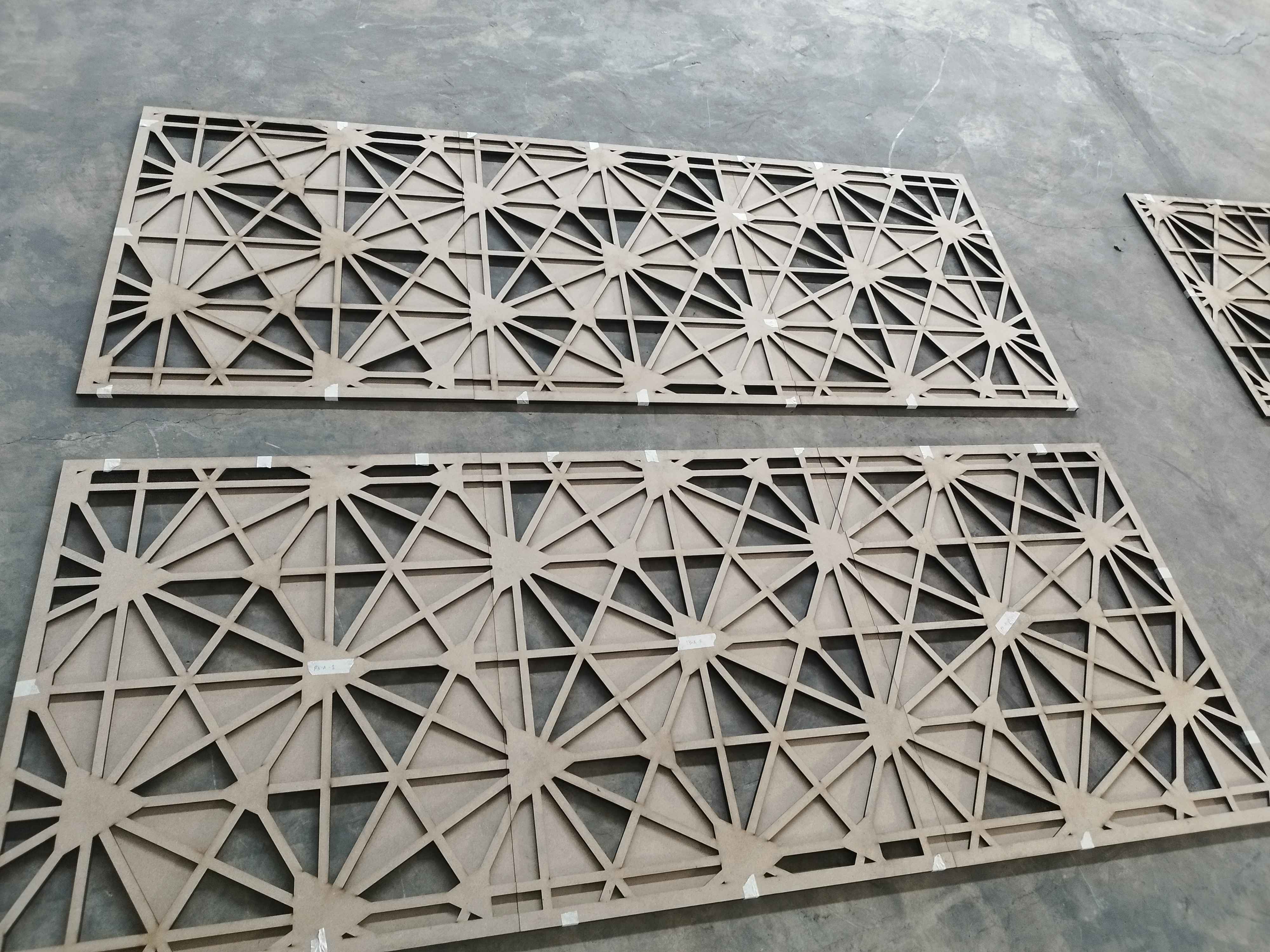 Laser-cut decorative panel detail showing clean geometric precision