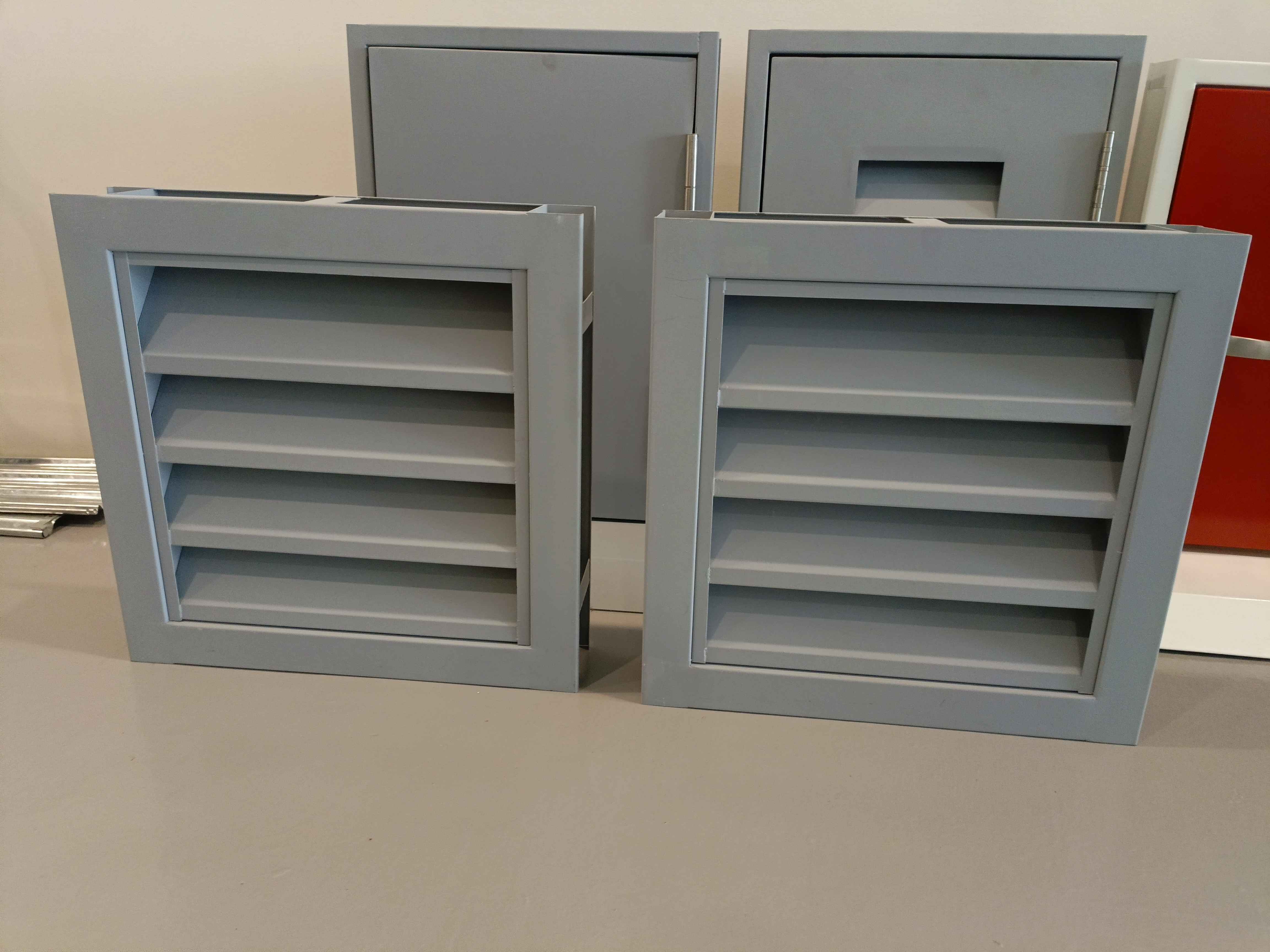 Louvered steel windows and door units displayed together